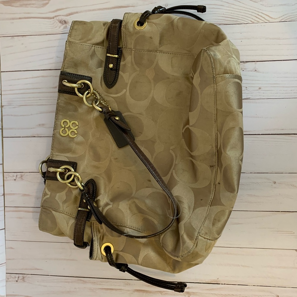 Tan monogram Coach shoulder bag